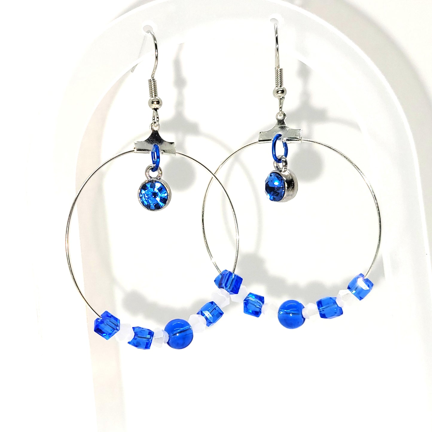 Handcrafted with recycled beads--Blue & white beads, blue jewel 2 inch dangle silver toned earring.