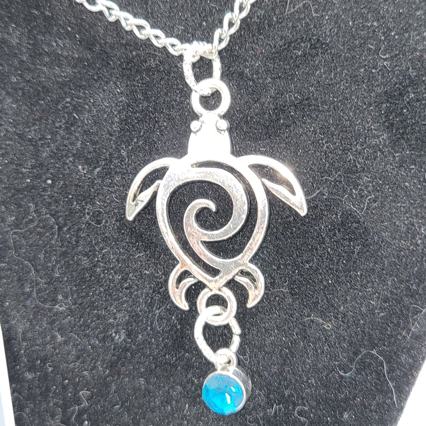 Handcrafted Silver toned Turtle charm necklace & earring with turquoise colored dangle jewel,