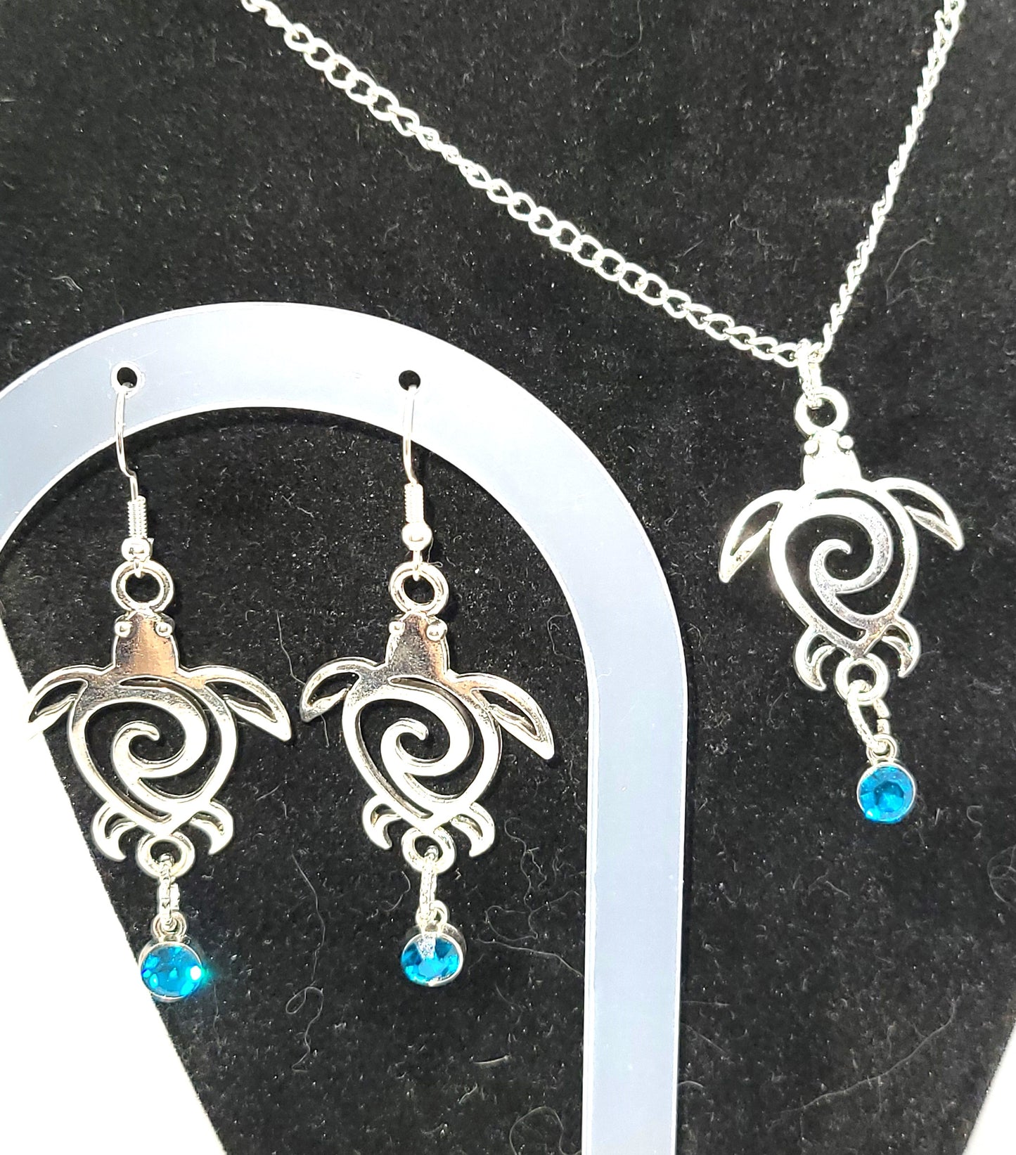 Handcrafted Silver toned Turtle charm necklace & earring with turquoise colored dangle jewel,