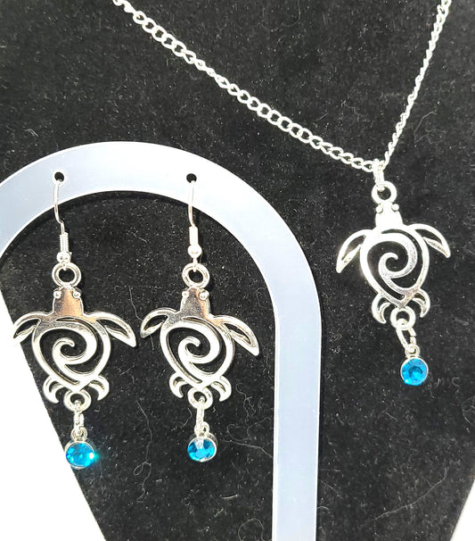 Handcrafted Silver toned Turtle charm necklace & earring with turquoise colored dangle jewel,