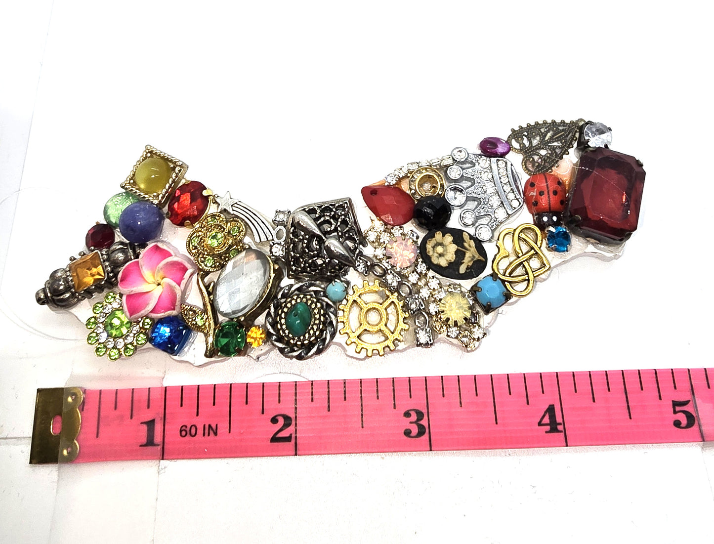 Handcrafted from recycled Materials, 5 inch California bejewled ornament