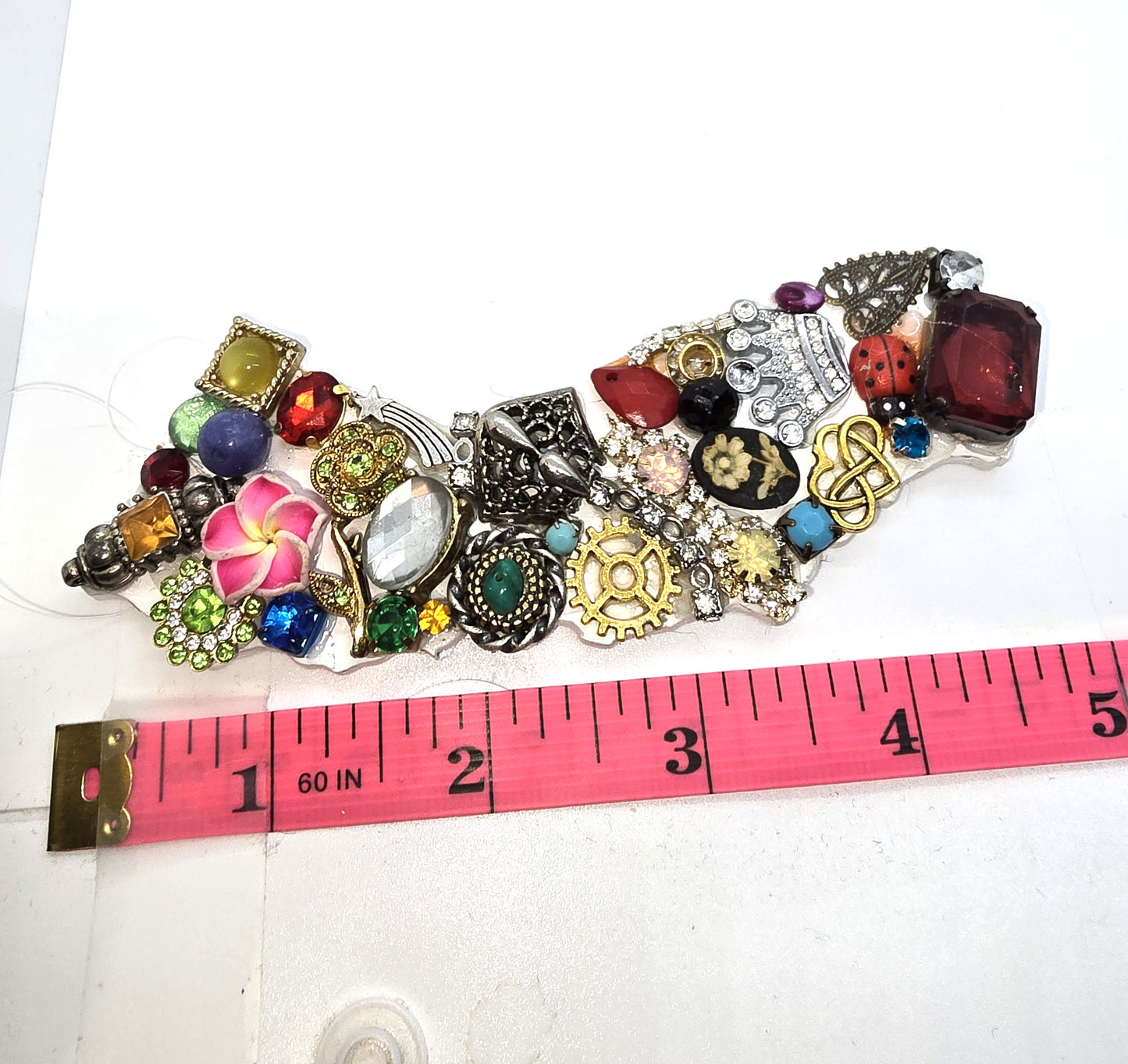 Handcrafted from recycled Materials, 5 inch California bejewled ornament