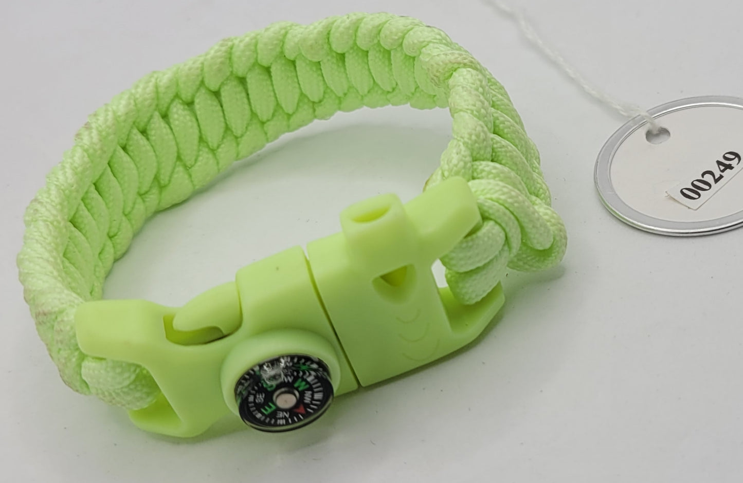 The Glow In Dark green paracord bracelet with a tool Buckle.