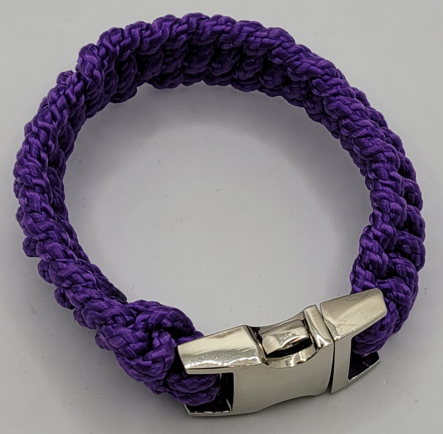 Dark Purple paracord bracelet has a Silver metal buckle