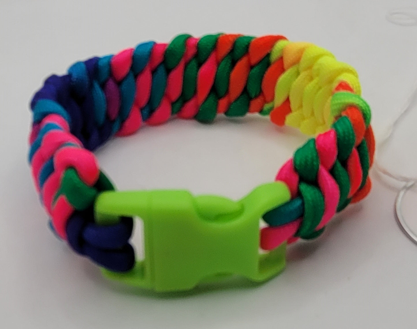 Handcrafted Fluorescent paracord bracelet with a green neon buckle