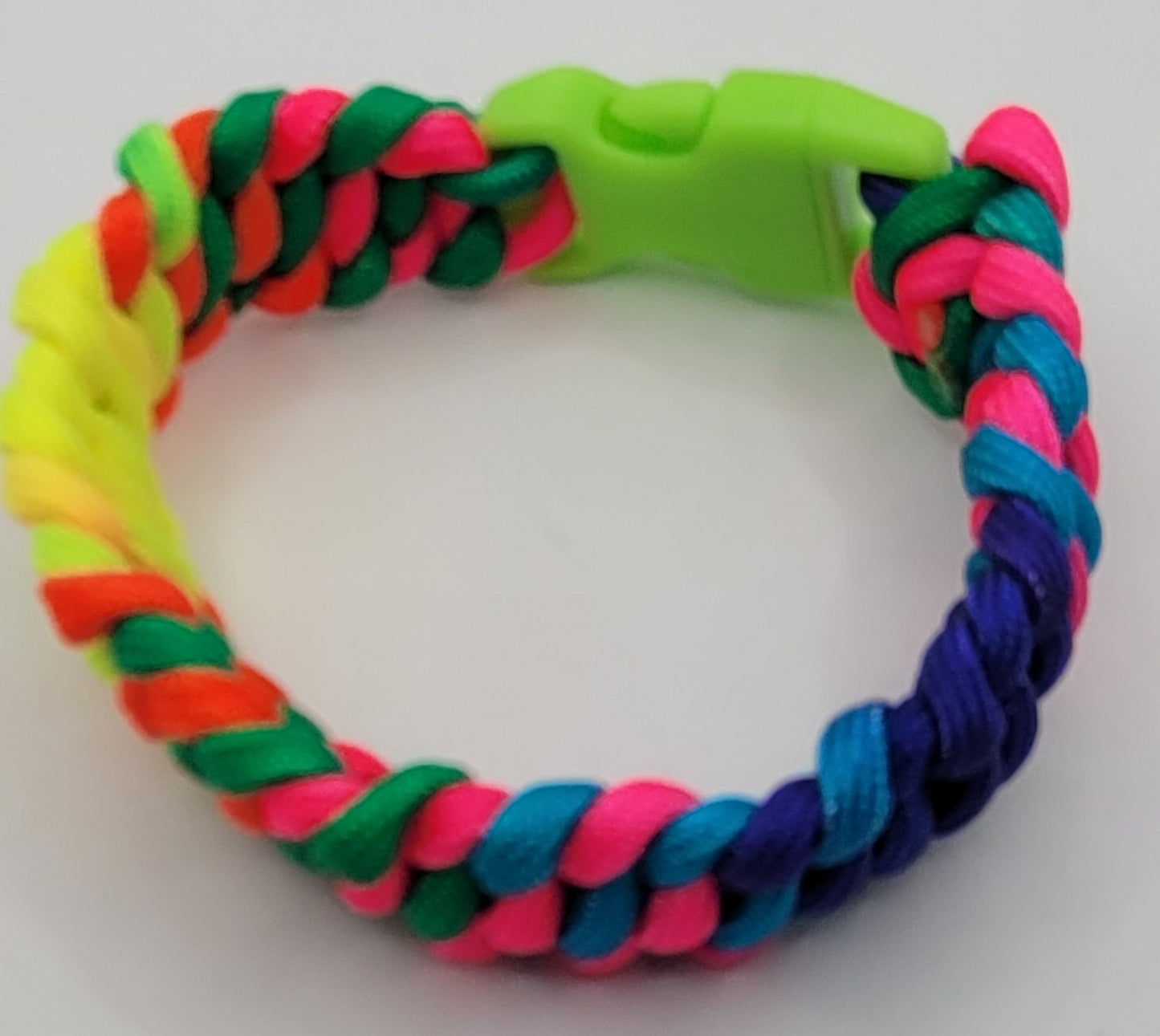 Handcrafted Fluorescent paracord bracelet with a green neon buckle